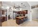 Spacious kitchen with granite countertops, a center island with seating, and stainless steel appliances at 1478 Brigadier Dr, Spring Hill, FL 34608