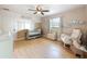 Charming Bedroom with a crib, rocking chair, and tasteful decor at 1652 Larkin Rd, Spring Hill, FL 34608