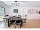 Charming dining room with wood table and black chairs, and decorative wall art at 1652 Larkin Rd, Spring Hill, FL 34608