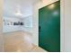 Open entryway showcasing bright living room with wood floors and modern decor at 1652 Larkin Rd, Spring Hill, FL 34608