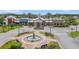 Beautiful community center with a charming fountain and vibrant storefronts at 22289 Nebula Way, Land O Lakes, FL 34637