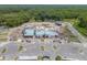 Aerial view of a newly built community center, complete with a water park and clubhouse at 22289 Nebula Way, Land O Lakes, FL 34637
