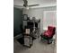 Home office with a ceiling fan, computer desk, and two chairs, decorated with Ohio State sports paraphernalia at 22289 Nebula Way, Land O Lakes, FL 34637