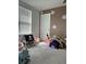 Fun playroom featuring a dollhouse, ball pit, and a wooden climber at 22289 Nebula Way, Land O Lakes, FL 34637