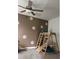 Playroom area featuring daisy decals on a brown wall and a wooden climber with slide at 22289 Nebula Way, Land O Lakes, FL 34637
