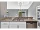 Kitchen area featuring granite countertops, stainless steel dishwasher, and a view to the dining area at 2476 Magellan Ave, Spring Hill, FL 34608