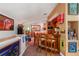 Custom wet bar with a full assortment of liquor, barstools, and unique decor at 26221 Pheasant Run, Wesley Chapel, FL 33544