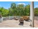 Relaxing wooden deck with comfortable seating and scenic wooded views at 26221 Pheasant Run, Wesley Chapel, FL 33544