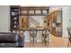 Open concept kitchen with bar seating and seamless flow to other living spaces at 26221 Pheasant Run, Wesley Chapel, FL 33544