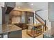 Well-equipped kitchen featuring granite countertops, stainless steel appliances, and ample cabinet space at 26221 Pheasant Run, Wesley Chapel, FL 33544