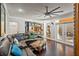 Expansive living room featuring hardwood floors and an open concept layout at 26221 Pheasant Run, Wesley Chapel, FL 33544
