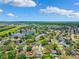 An aerial shot of a residential area with several small ponds and green landscape at 3204 Payne St, New Port Richey, FL 34655