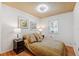 Cozy bedroom with warm lighting, decorative wall art, and comfortable furnishings, perfect for relaxation at 3204 Payne St, New Port Richey, FL 34655
