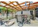 Cozy covered patio with dining set and water feature perfect for outdoor relaxation at 3204 Payne St, New Port Richey, FL 34655