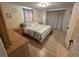 Bright bedroom featuring natural light and a well-coordinated furniture set at 3252 Columbus Dr, Holiday, FL 34691