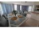Cozy dining area featuring a glass table with seating for four under natural light at 3252 Columbus Dr, Holiday, FL 34691