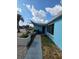 Inviting entrance with a walkway and a covered front porch area at 3252 Columbus Dr, Holiday, FL 34691