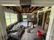 Living room with exposed beams and studs due to a renovation project at 34767 Evergreen Way, Ridge Manor, FL 33523