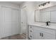 Bathroom features granite vanity and closet at 3498 Plaza Ave, Spring Hill, FL 34608