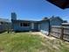 Spacious back yard featuring green grass and the exterior of the home at 4027 31St N Ave, St Petersburg, FL 33713