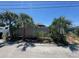 Image shows a backyard with an enclosed fence and a covered gazebo behind the fence at 4027 31St N Ave, St Petersburg, FL 33713