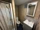 Compact bathroom features a shower, toilet, and vanity, perfect for functionality at 4027 31St N Ave, St Petersburg, FL 33713