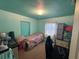 Bedroom featuring a desk, workspace, and a brightly colored ceiling and walls at 4027 31St N Ave, St Petersburg, FL 33713