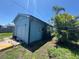 Detached garage featuring a garage door, and exterior palm trees at 4027 31St N Ave, St Petersburg, FL 33713