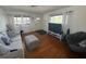 Inviting living room with hardwood floors, modern furniture, and ample natural light at 4027 31St N Ave, St Petersburg, FL 33713