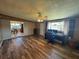 Spacious living room with wood flooring and large window bringing in natural light at 4027 31St N Ave, St Petersburg, FL 33713