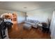 Bright living room with hardwood floors and an open archway to the dining area at 4027 31St N Ave, St Petersburg, FL 33713