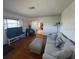 Bright living room with hardwood floors and a comfortable seating arrangement at 4027 31St N Ave, St Petersburg, FL 33713