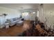 Cozy living room featuring hardwood floors, neutral decor, and ample natural light at 4027 31St N Ave, St Petersburg, FL 33713