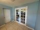 Bright office space with natural light filtering through double doors and neutral paint at 4027 31St N Ave, St Petersburg, FL 33713