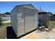 Outdoor shed with storage, surrounded by a wooden fence at 4027 31St N Ave, St Petersburg, FL 33713