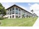 Spacious condo building with well-maintained lawn and landscaping at 4452 Garnet Dr # 302, New Port Richey, FL 34652