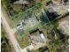 Aerial view of a residential lot with a house and green boundary lines showing property lines at 5048 Teather St, Spring Hill, FL 34608
