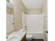 Cozy bathroom featuring a shower and tub combination with a single sink vanity at 5048 Teather St, Spring Hill, FL 34608