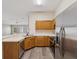A well-equipped kitchen with stainless steel appliances and ample counter space for culinary adventures at 5048 Teather St, Spring Hill, FL 34608