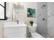 Elegant bathroom featuring shower with marble tile and a modern vanity at 5215 Azalea Cir, Dade City, FL 33523