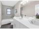Modern bathroom with tub and shower combination, sleek vanity and fixtures at 5215 Azalea Cir, Dade City, FL 33523