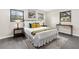 Inviting bedroom featuring warm lighting, stylish furniture, and a comfortable bed at 5215 Azalea Cir, Dade City, FL 33523