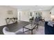 Open-concept living room and dining area with plenty of natural light at 5215 Azalea Cir, Dade City, FL 33523