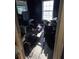 This bedroom has two large windows, wood flooring, and vintage style furniture at 5420 Bay Blvd, Port Richey, FL 34668