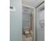 Cozy bathroom with toilet and laundry at 5640 Ferguson Ct # 2203, New Port Richey, FL 34652