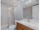 Updated bathroom with a modern vanity, sink, and shower at 5640 Ferguson Ct # 2203, New Port Richey, FL 34652