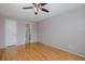 Hardwood floors and open doorway from the bedroom to the bathroom at 5640 Ferguson Ct # 2203, New Port Richey, FL 34652