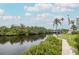 Scenic water view of the canal and lush green landscaping at 5640 Ferguson Ct # 2203, New Port Richey, FL 34652