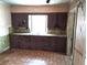 Kitchen with floral accents and dated features at 5748 Montana Ave, New Port Richey, FL 34652
