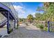 Landscaped backyard on canal includes a firepit, bench seating, and stairway access to the house at 6241 Colony Cir, Weeki Wachee, FL 34607